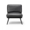 Spine Lounge Suite Chair Petit, i sort læder, kan anvendes til indretning af den lille lounge
