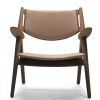 CH28 loungestol, læder, Design Hans J. Wegner, lænestol i træ, Carl Hansen & Søn. Kan anvendes i privat stue, eller klinik.