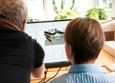 2 personer indretter lokale i 3D