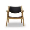 CH28 loungestol, sort læder, Design Hans J. Wegner, lænestol i træ, Carl Hansen & Søn. Kan anvendes ex i advokatkontor.