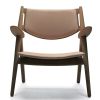 CH28 loungestol, læder, Design Hans J. Wegner, lænestol i træ, Carl Hansen & Søn. Kan anvendes i privat stue, eller klinik.